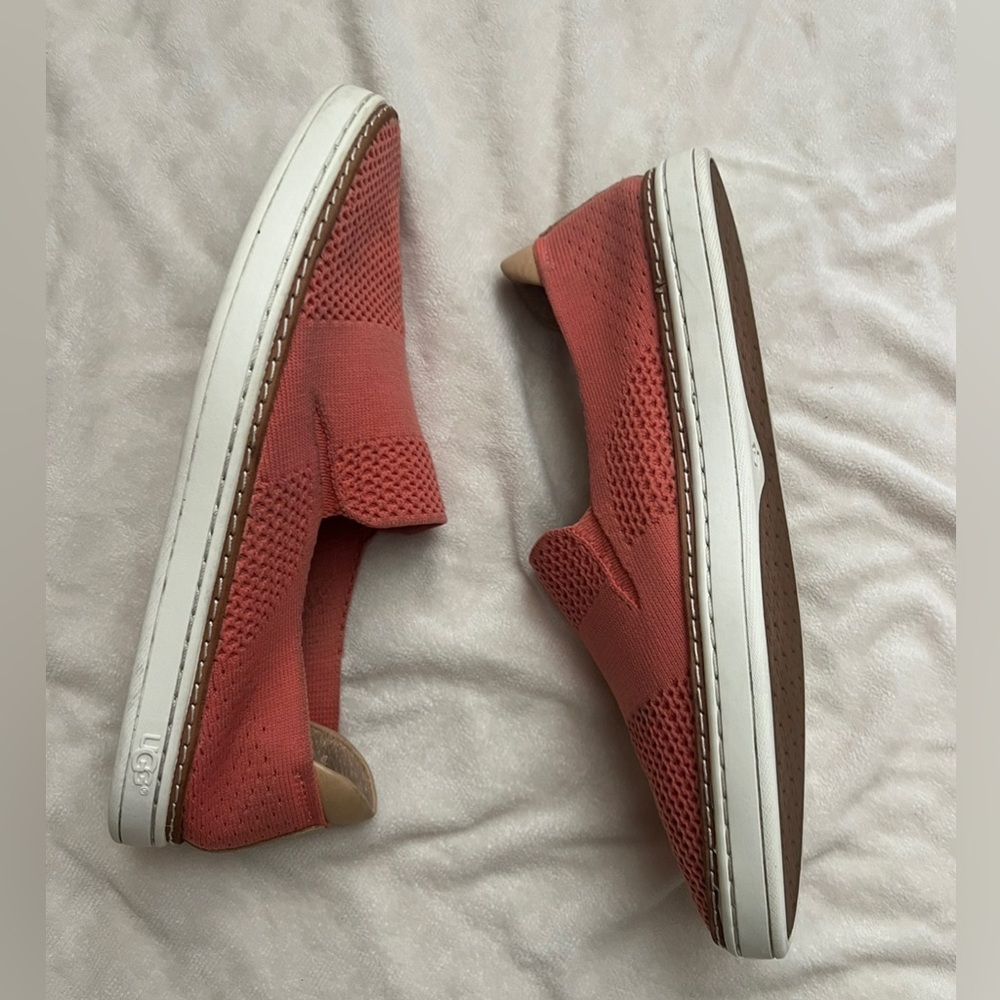 UGG women’s slip on sneaker, peach/tangerine color with white soles, size 7.5